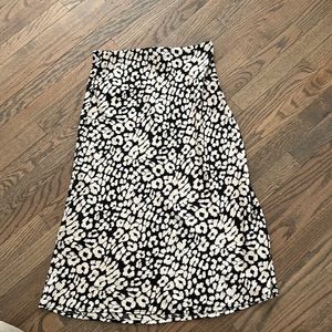 Black and cream animal print midi skirt, size large never worn!